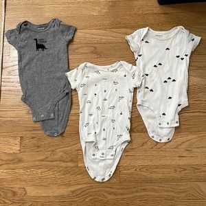 Baby boys set of three dinosaur bodysuits